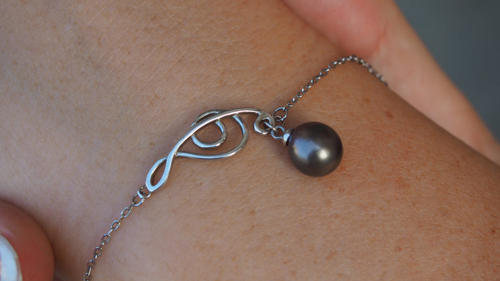 Bracelet musical en argent 925 orné d'une authentique perle de Tahiti aubergine